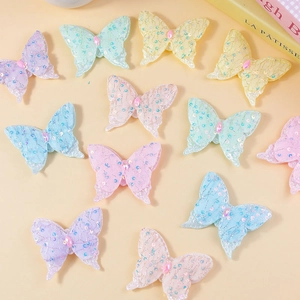 Sparkly fabric butterfly patches with sequins and rhinestones for DIY crafts and hair decor