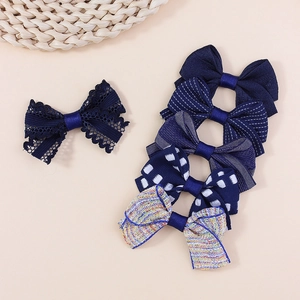 Set of five handmade dark blue bow accessories in lace, satin, stripe, mesh and tweed fabrics