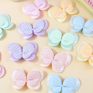 Colorful sequin butterfly patches for DIY crafts and clothing accessories in pastel tones