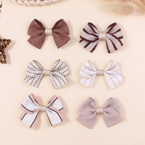 Set of 6 assorted handmade fabric bow hair clips in plaid and corduroy textures