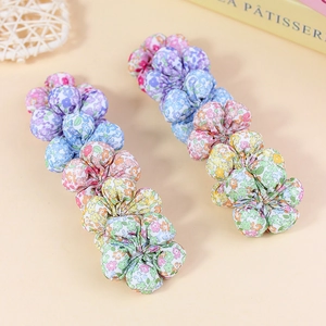 Floral fabric flower hair accessories for DIY jewelry in pastel blue and pink tones