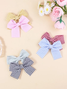 Close-up of woven plaid bow accessories in six pastel colors for DIY shoe decoration