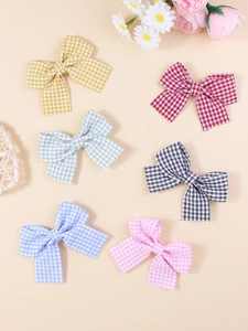 Close-up of woven plaid bow accessories in six colors for DIY shoe and hair decor
