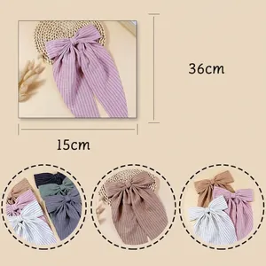 Striped bow hair clip with streamers for high ponytail, in pink, blue and beige colors