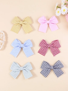 Set of six colorful checkered fabric bow accessories for DIY crafts and fashion decor