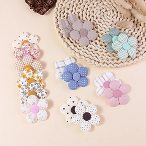 Handmade 3D fabric flower accessories with floral patterns and buttons for DIY crafts
