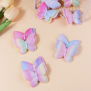 Double-layered gradient butterfly bows with glitter fabric and white pearls for DIY decor