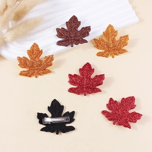 Sparkly maple leaf hair clips set in autumn colors with glitter finish for women