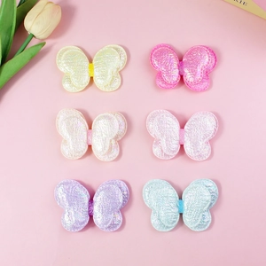 Set of 6 glitter bow hair clips in pastel colors with pearlescent finish and tulip decor