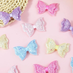 Sparkly glitter bow hair accessories for kids in assorted pastel colors for DIY crafts