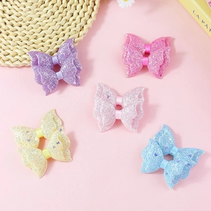 Five-piece glitter bow hair accessory set in pastel colors with shimmering fabric