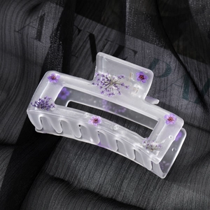 Matte translucent rectangle hair claw clip with purple dried flowers and resin