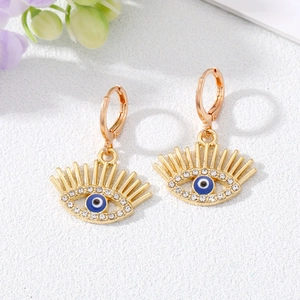 Boucles d'oreilles créoles Œil Bleu en or avec strass scintillants pour femmes