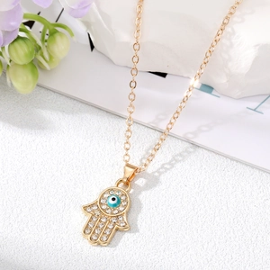 Collana mano di Fatima dorata con ciondolo malocchio e strass brillanti per donna