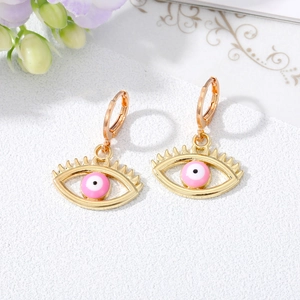 Retro hollow evil eye hoop earrings with eyelashes and pink resin bead in gold finish