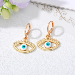 Retro golden evil eye hoop earrings with blue pupil and hollow eyelash details on stone