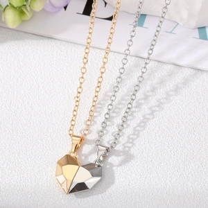 Magnetic heart pendant necklace for couples with faceted gold and silver finish