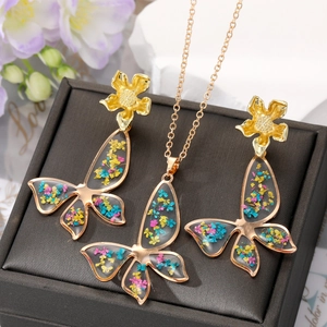 Set gioielli fiore farfalla placcato oro con ciondoli colorati in resina di fiori secchi