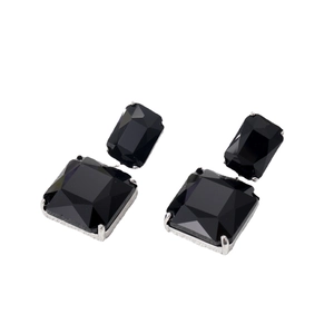 Modern black geometric crystal earrings with silver-tone prong setting and faceted stones