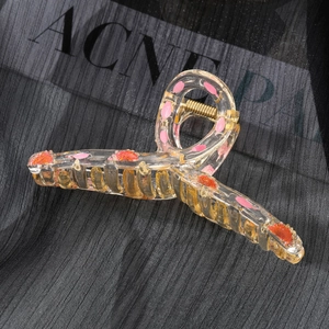 Transparent resin shark hair claw clip with real orange and pink dried flower petals