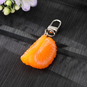 Realistic orange slice keychain with resin pulp texture and silver metal lobster clasp
