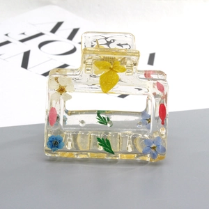 Transparent butterfly hair claw clip with real colorful dried flowers in resin