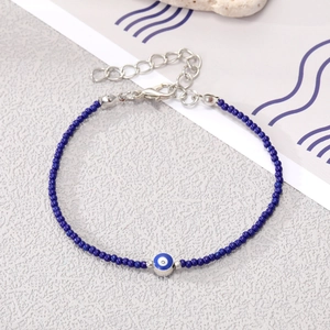 Bohemian dark blue beaded Evil Eye bracelet with adjustable silver lobster clasp
