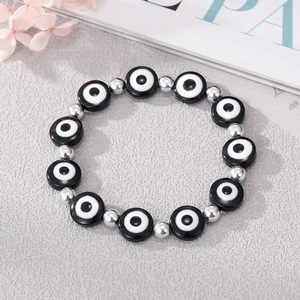Bracelet rétro œil de démon avec perles en résine bleue translucide et perles argentées