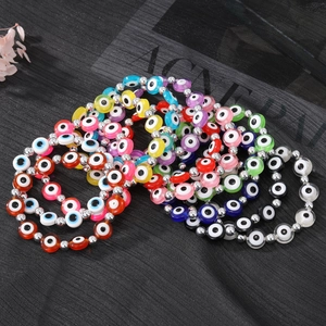 Bracelets de perles œil grec faits main avec breloques en résine et espaceurs argentés