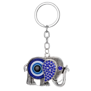 Silver elephant evil eye keychain with blue rhinestones and ethnic pattern on white background
