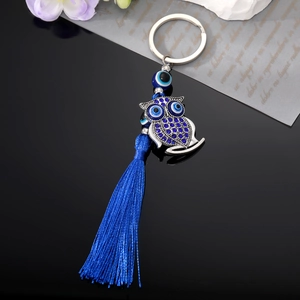 Vintage owl keychain with blue rhinestones, evil eye charm and long tassels pendant