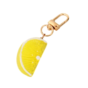 Realistic yellow lemon slice keychain with gold lobster clasp for bags and accessories