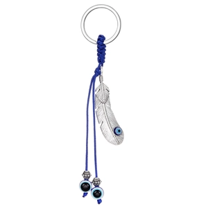 Porte-clés Plume Mauvais Œil Ethnique pour Hommes Femmes Alliage Résine Perles Bleues Corde Tressée Charme Porte-clés Pendentif de Sac