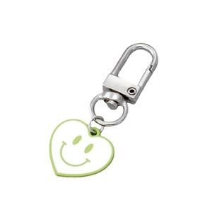 Porte-clés cœur souriant mignon avec contour vert pour décoration de sac à main