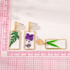 Handmade gold rectangle resin drop earrings with real dried purple flowers and green ferns