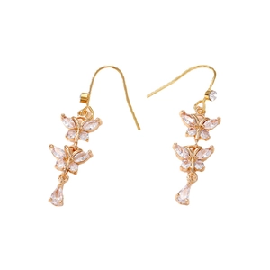 Elegant gold butterfly dangle earrings with sparkling rhinestones and crystal teardrop pendants