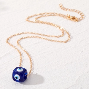 Ethnische Goldkette mit quadratischem blauen Harz-Böse-Auge-Würfelanhänger für Damen