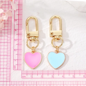 Pink and blue heart enamel keychains with gold-plated alloy hooks and colorful candy tones
