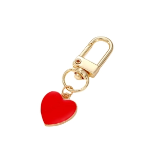 Vibrant red heart keychain with gold-plated lobster clasp and ring for bag decoration