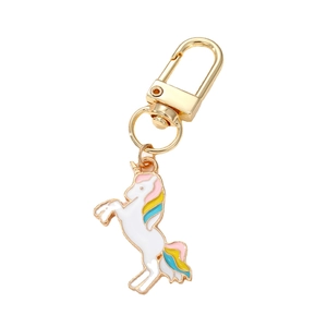 Cartoon unicorn keychain with white enamel body and rainbow gradient mane on golden ring