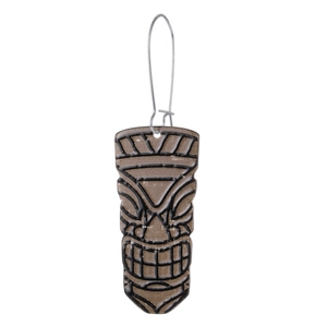Macro view showing details of African tribal tiki mask acrylic long drop earrings