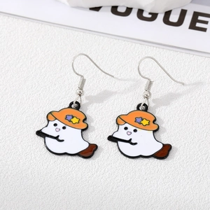 Detail of cartoon ghost earrings with orange witch hat and enamel finish for Halloween