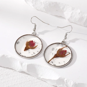 Minimalist round dried flower drop earrings with red blossom and silver leaf inserts
