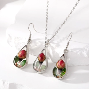 Teardrop pendant necklace and earring set with real red dried roses in clear resin