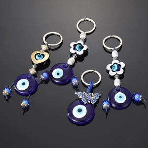 Porte-Clés Mauvais Œil Style Ethnique Tribal Alliage Verre Vintage Cœur Papillon Fleur Nazar Pendentif De Sac Pour Femme