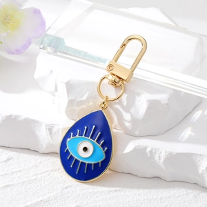 Vintage water drop Evil Eye keychain in golden alloy with blue enamel and hook clasp