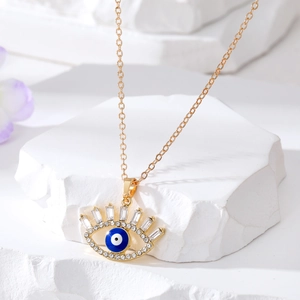 Collier doré avec pendentif Œil bleu serti de cristaux brillants et émaillés