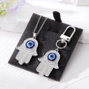 Hamsa Hand en Boze Oog ketting met bijpassende sleutelhanger set en blauwe kristallen