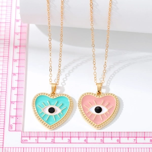 Ethnic devil eye heart pendant necklace in cyan and pink with fine golden cross chain