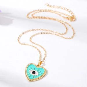Minimalist gold heart Evil Eye necklace with turquoise enamel and beaded edge detail